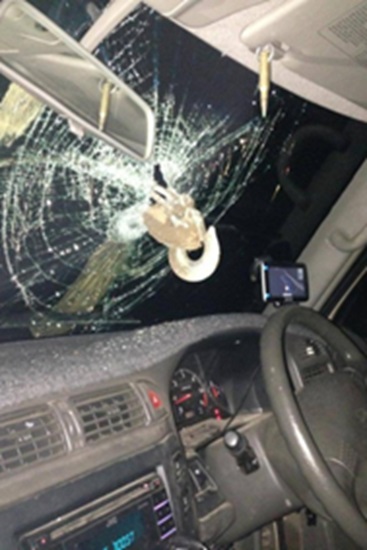 Two rope breaks and shoots through windshield